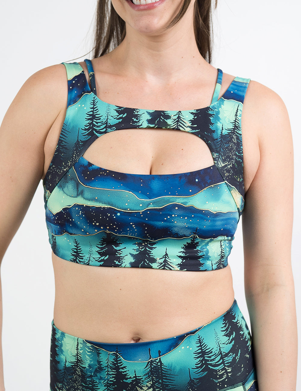 front of the aurora forest vista bra against a white background