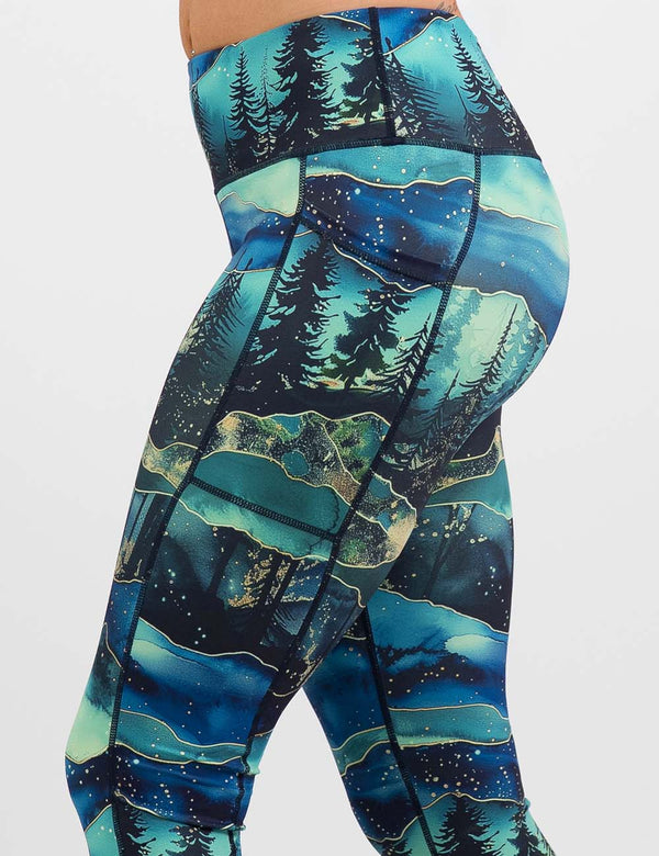 close up of the aurora forest pattern leggings