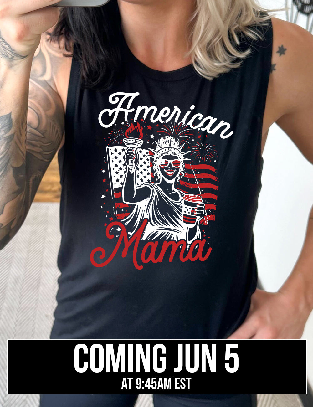 black muscle tank with the graphic of the statue of liberty in front of an American flag, fireworks above, wearing American flag sunglasses, holding a American flag coffee cup, with the words "American Mama" surrounding it