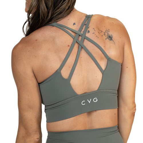 back view of the sage green sports bra