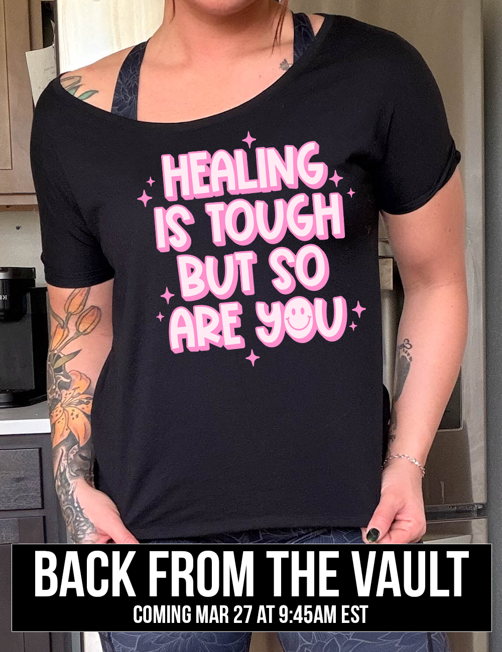 black slouchy tee with the words "healing is tough but so are you" on it, with a smiley face in the word "you", and little star graphics scattered around, coming soon