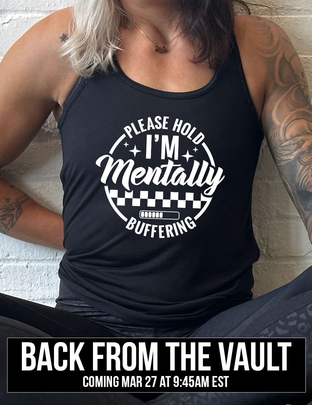 black racerback flowy tank with the words "please hold I'm mentally buffering" written on it in a circle graphic, with some of the words part of the arches, and within the circle there are two layers of checkerboard as well as a buffering bar, which is about 6 out of 10 full, coming soon