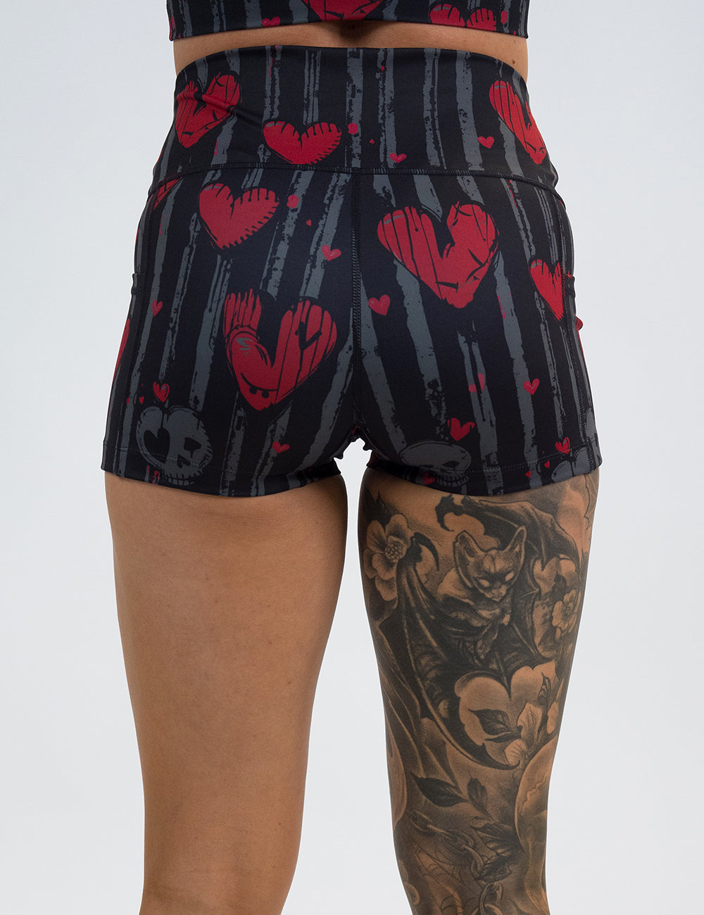 back of the 2.5 inch red hearts against stripes shorts against a white background