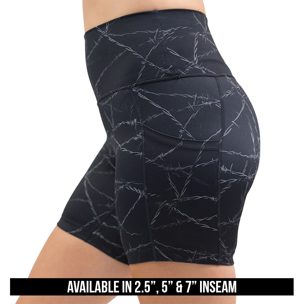 black shorts with a white barbed wire pattern on it