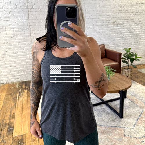 model wearing grey tank with a white barbell American flag design in the center