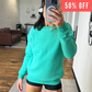 50% off of the basic spearmint colored crew neck