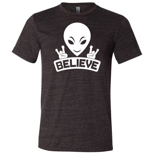 black unisex shirt that has an alien design on it that says "believe"