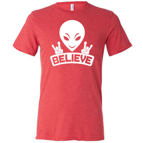 red unisex shirt that has an alien design on it that says "believe"