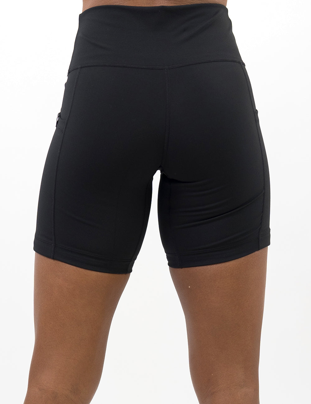 back of the 7 inch solid black shorts against a white background