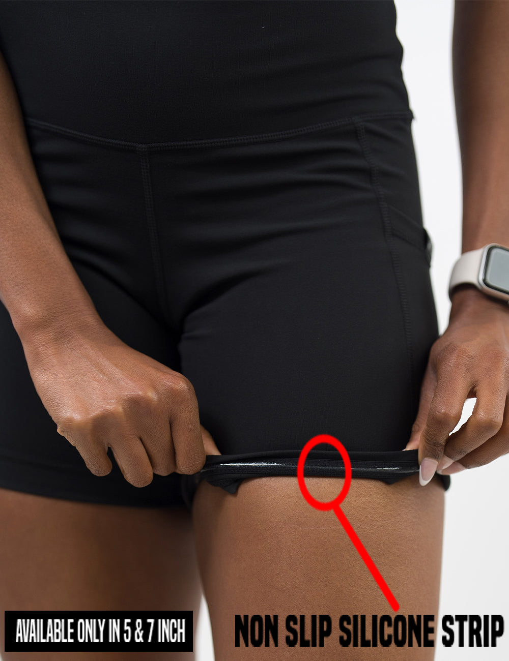close up of the solid black shorts rolled up to show the non slip silicone strip found in the 5 and 7 inch shorts