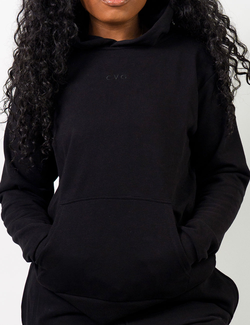 front of the black hoodie with a subtle CVG logo