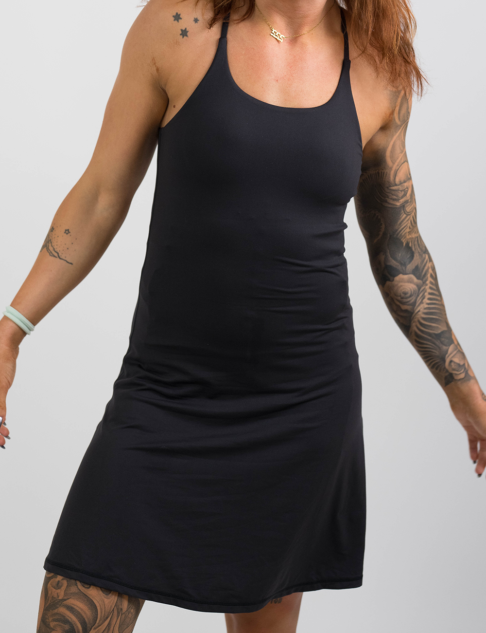 front of the longer black dress