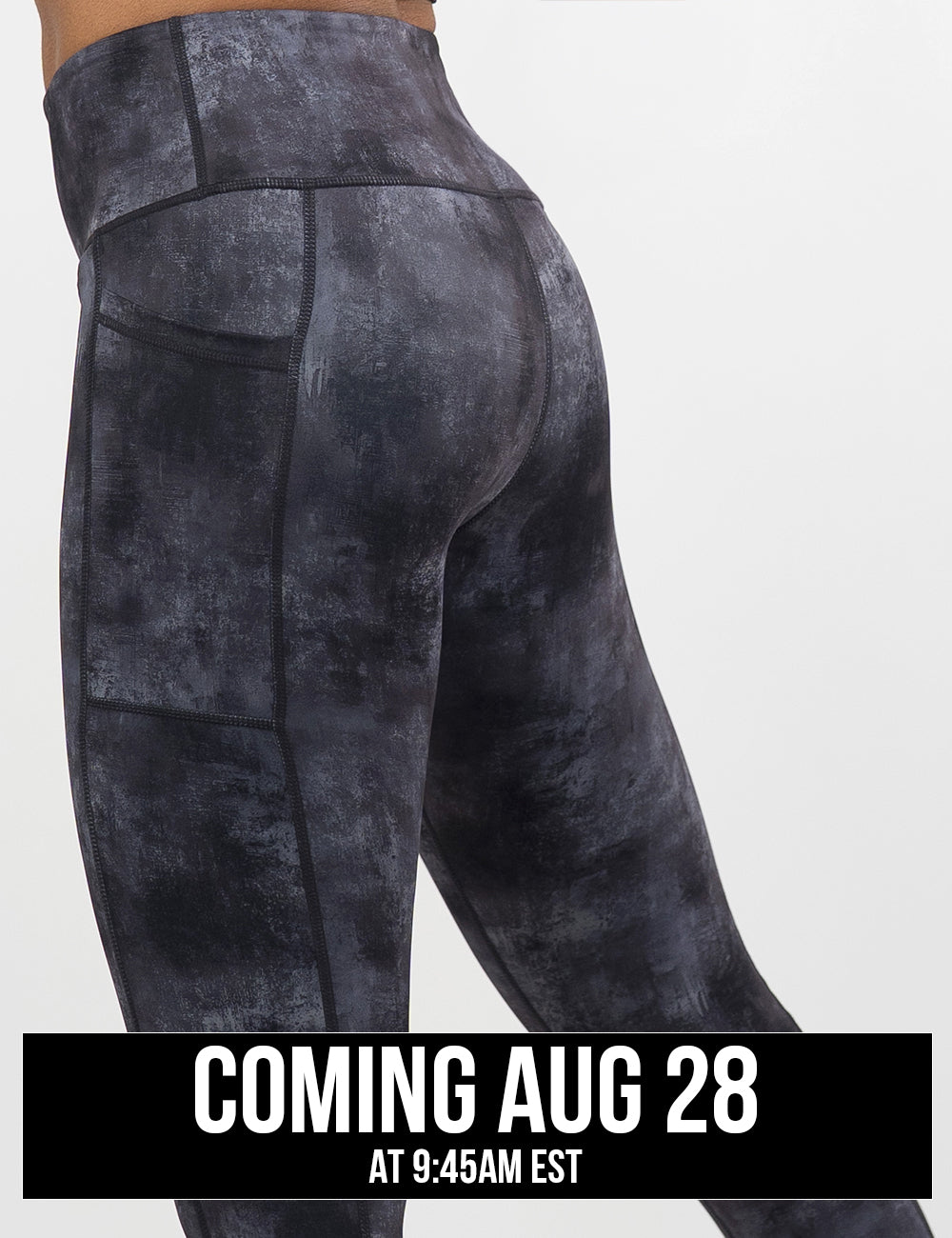 back of the black and grey grunge concrete pattern leggings, coming august 28