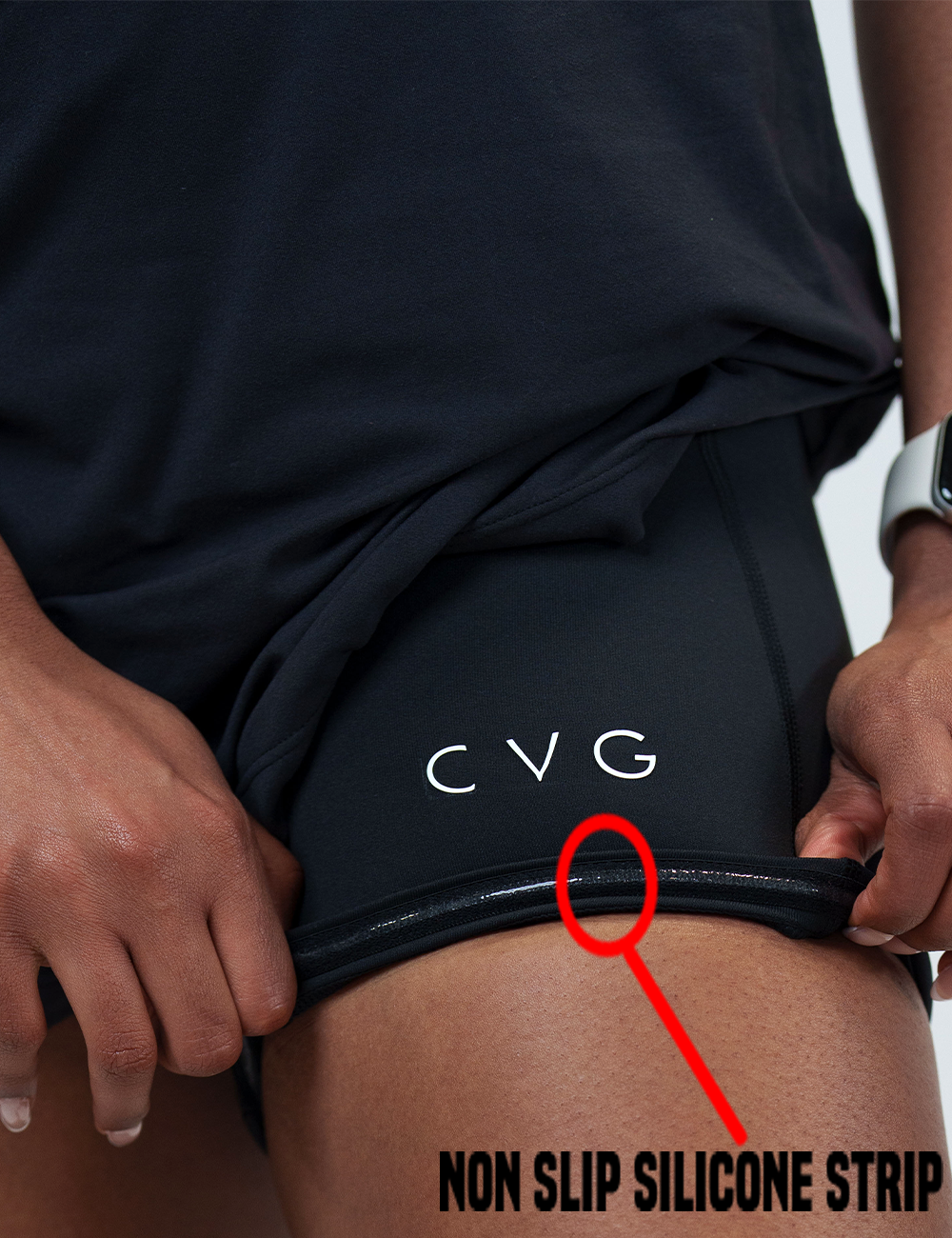 the short lining under the black half zip dress rolled up to show the non slip silicone strip