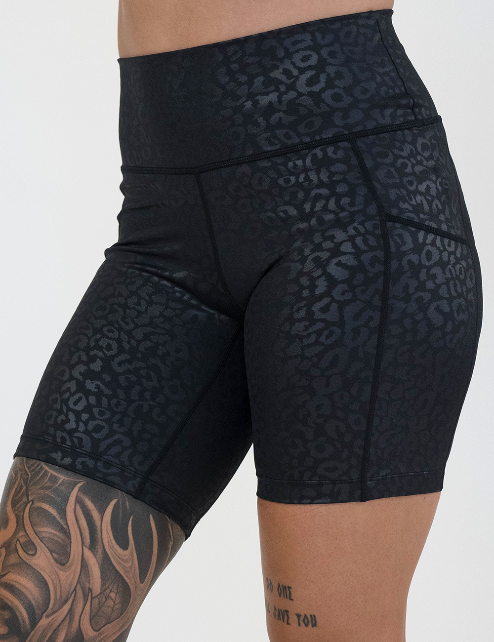 front of the 7 inch black leopard print shorts against a white background