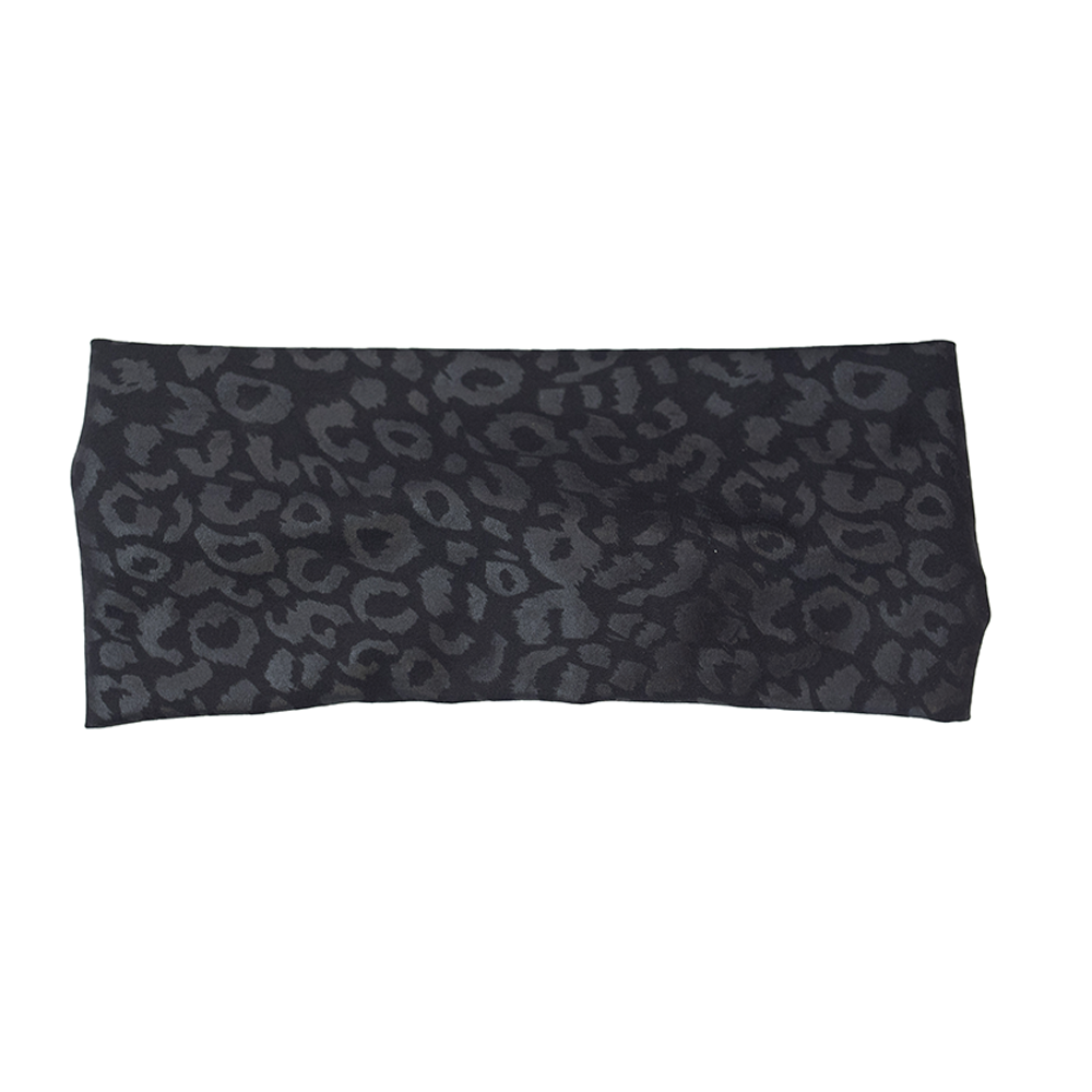 front of the black leopard print headband against a white background
