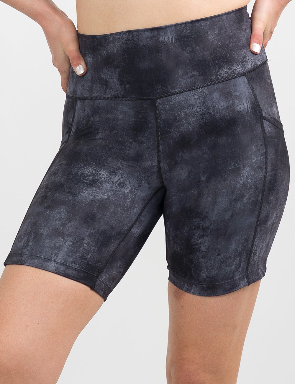 front of the black and grey grunge concrete pattern 5 inch shorts against a white background