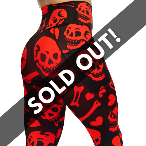 red and black leggings with skulls, bones and hearts sold out