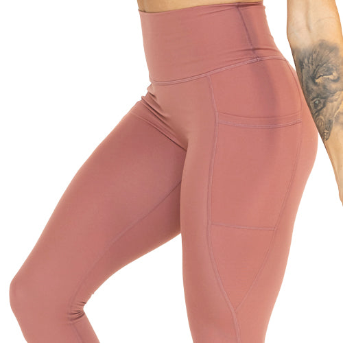 close up of solid blush pink leggings