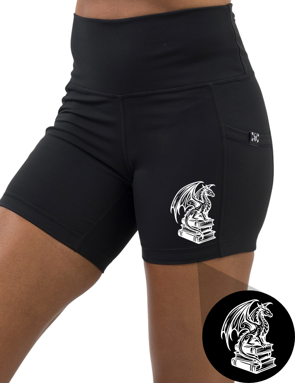front of the dragon sitting on books graphic 5 inch black shorts against a white background