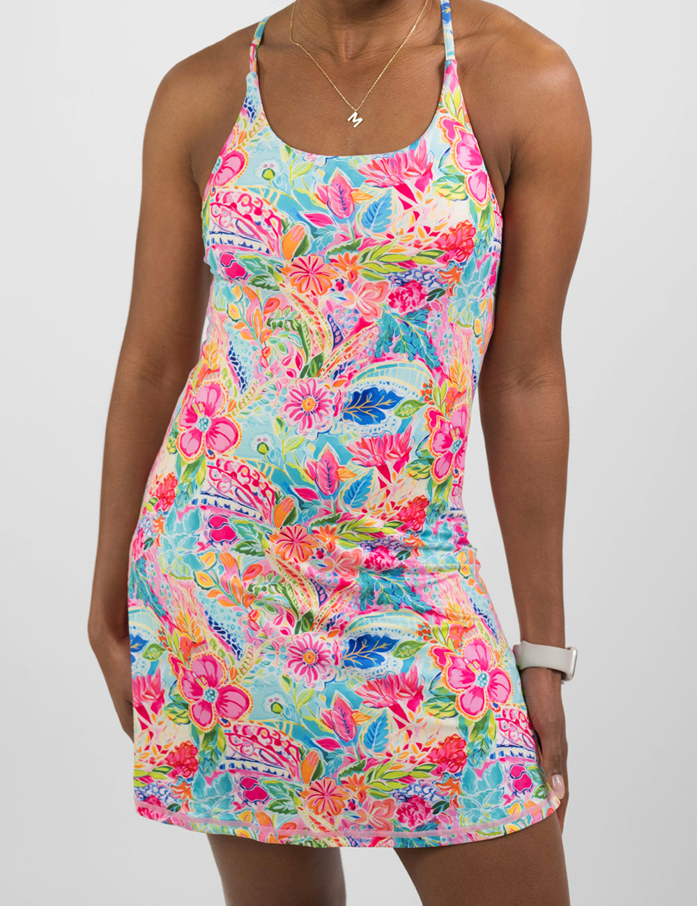 the colorful floral dress facing the front against a white background