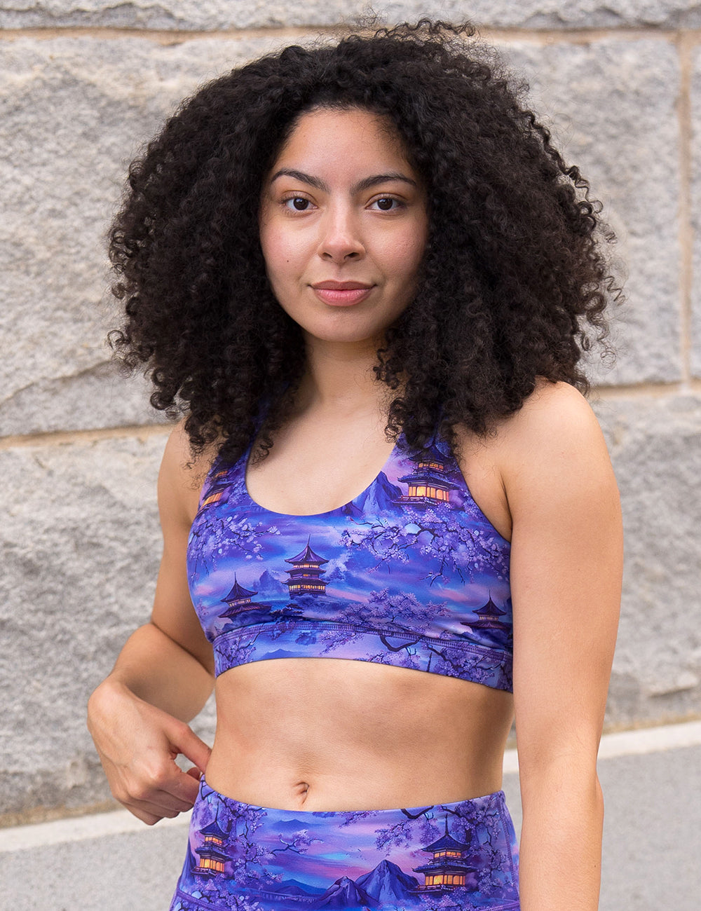 model wearing the lavender and blue butterfly back bra with traditional pagodas and blooming cherry trees
