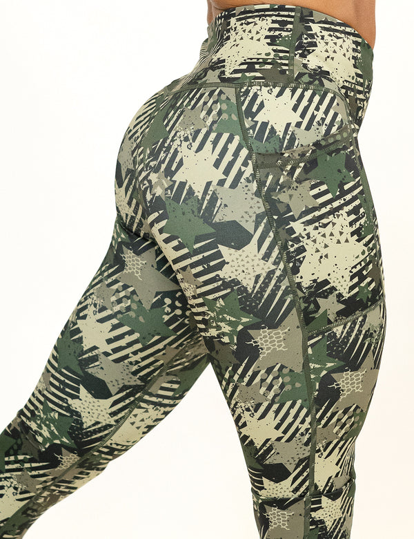 back of the green camo stars and stripes leggings against a white background