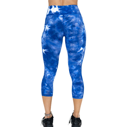 back view of capri length blue dye hard leggings