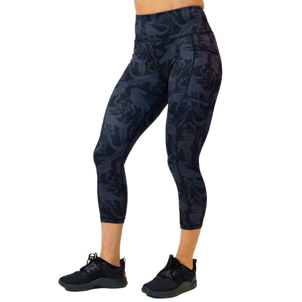 capri length black leggings with grey dinosaur pattern