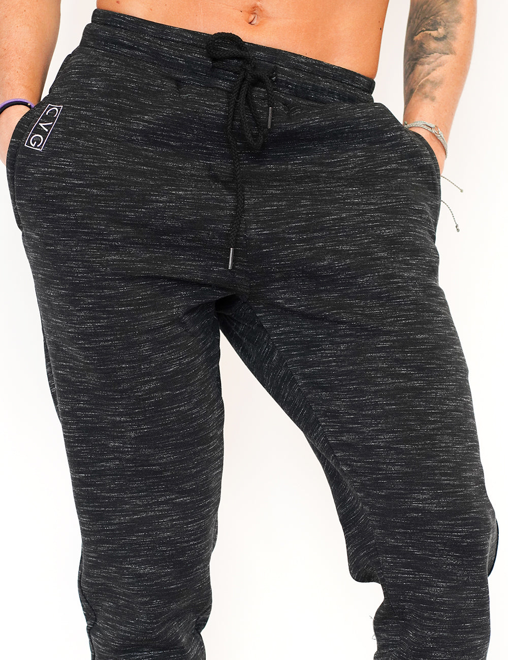 grey jogger pants with a drawstring on a white background