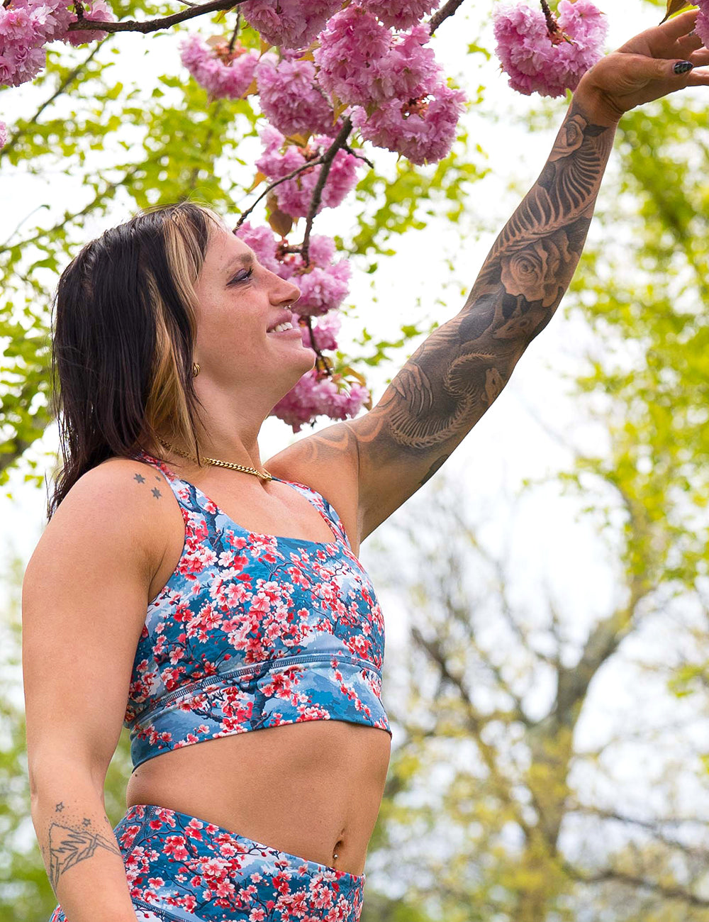 model wearing the blooming cherry tree print longline bra 