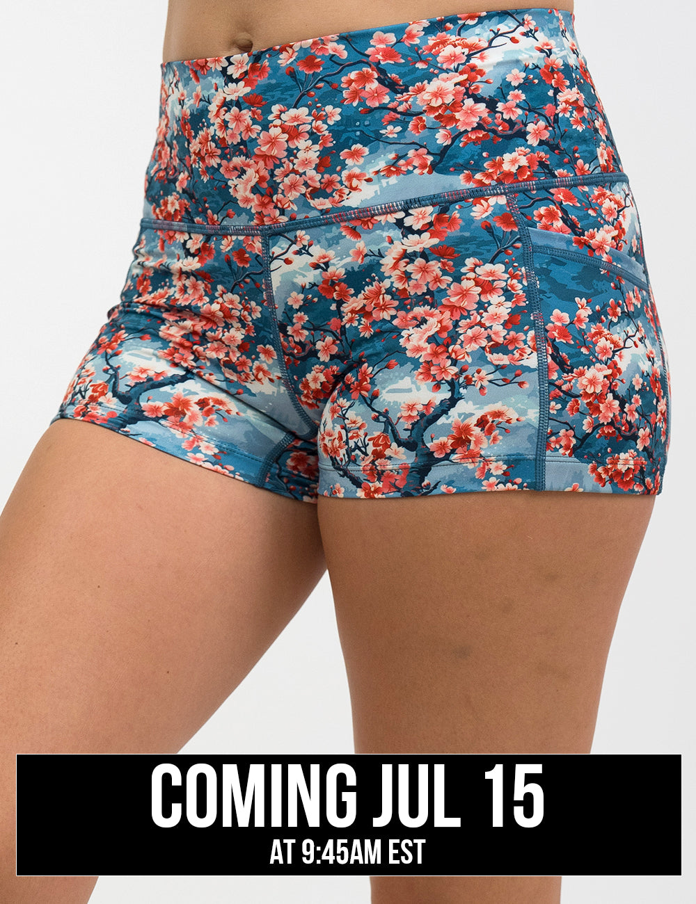 front of the 2.5 inch cherry tree shorts against a white background, coming july 15th
