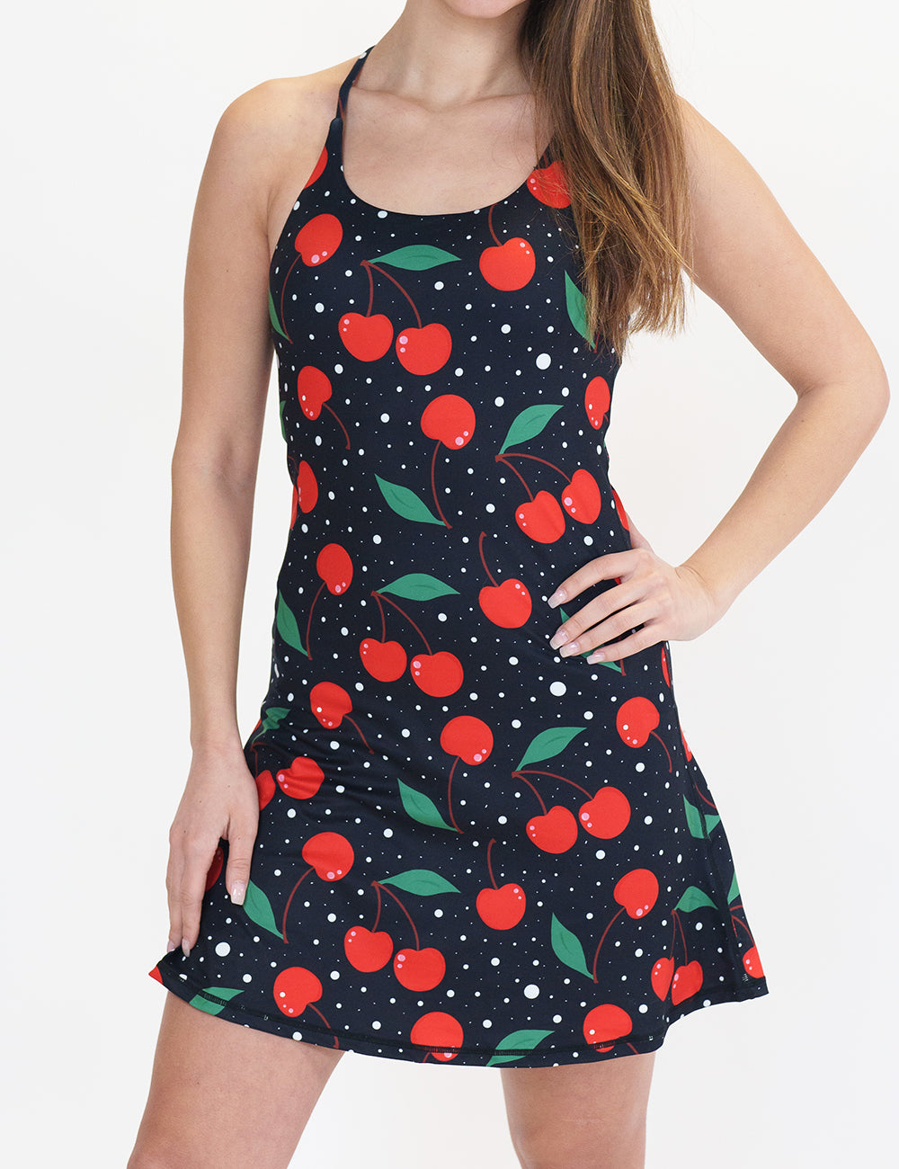 black dress with a cherry pattern on it