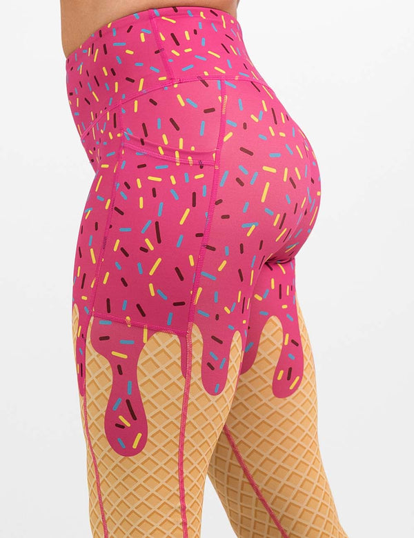 Ice cream leggings with pink sprinkle detailing at the top and a cone texture on the legs