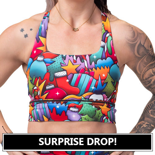surprise drop sports bra with a holiday ornament pattern