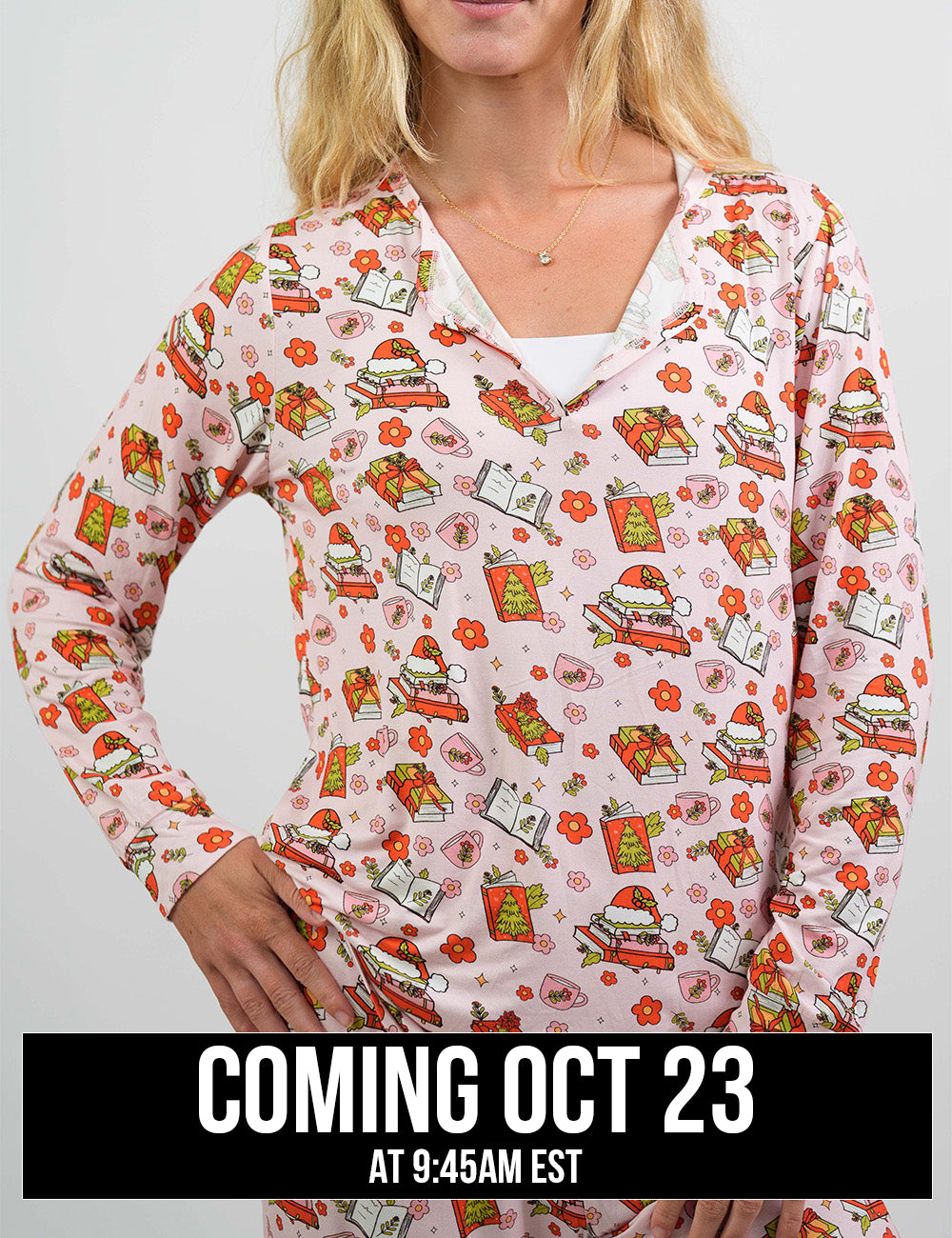 front of the Christmas books and flowers all over pink pajama top, coming October 23