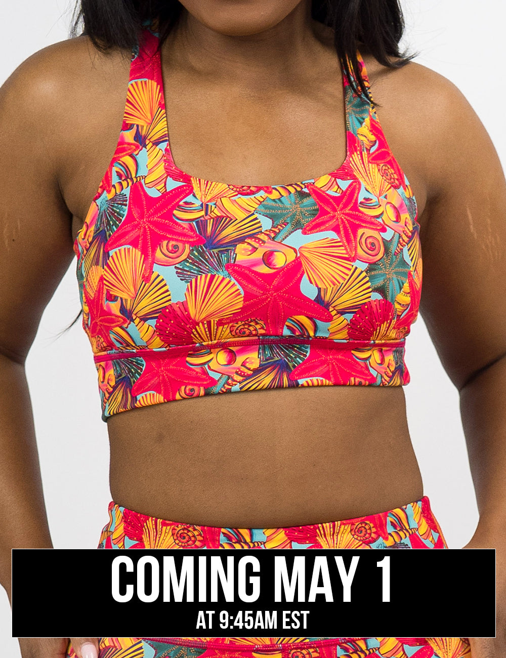 front of the red starfish with a yellow and blue shell background longline bra, coming may 1st