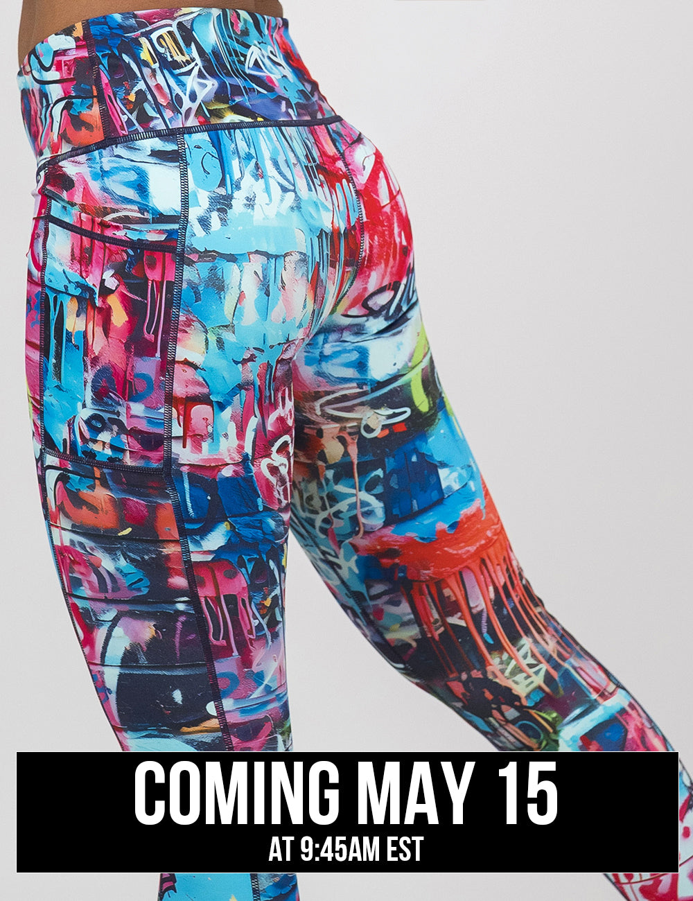back of the multi colored graffiti covered leggings against a white background, coming may 15th