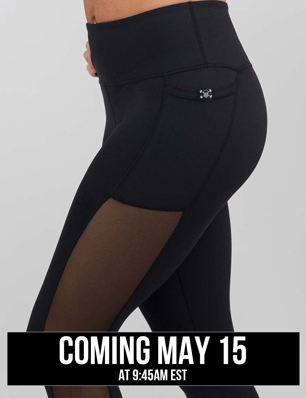 side of the black mesh leggings showing the mesh side lining, coming may 15th
