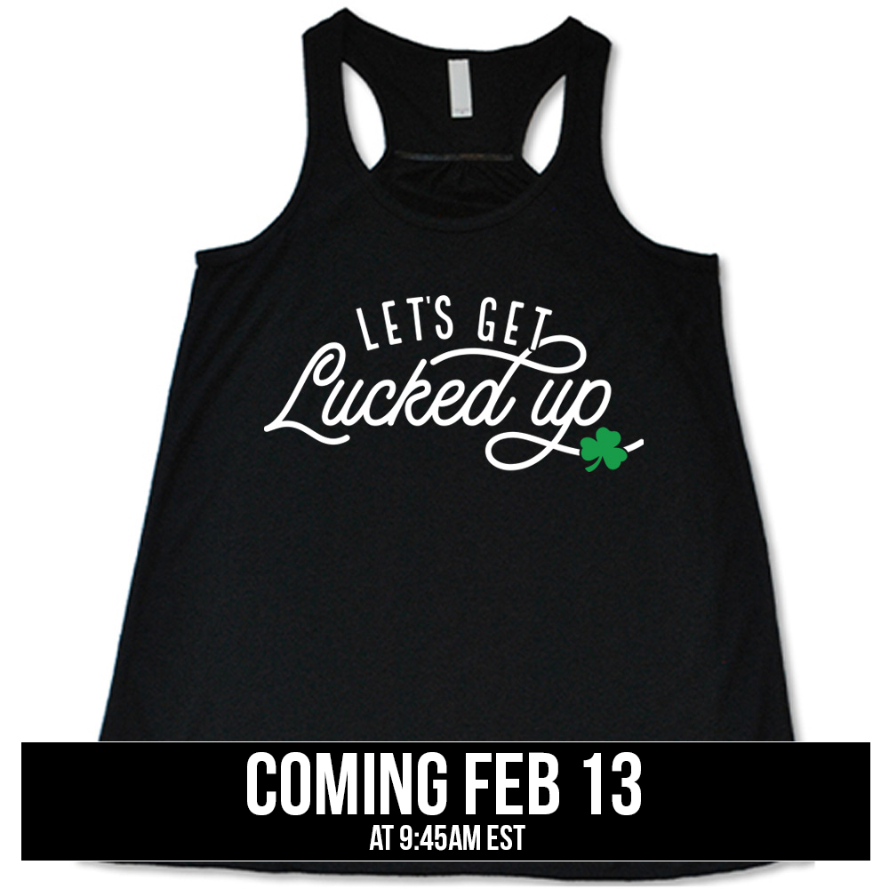 black flowy tank with the words "let's get lucked up" on it, with the small graphic of a shamrock, coming soon