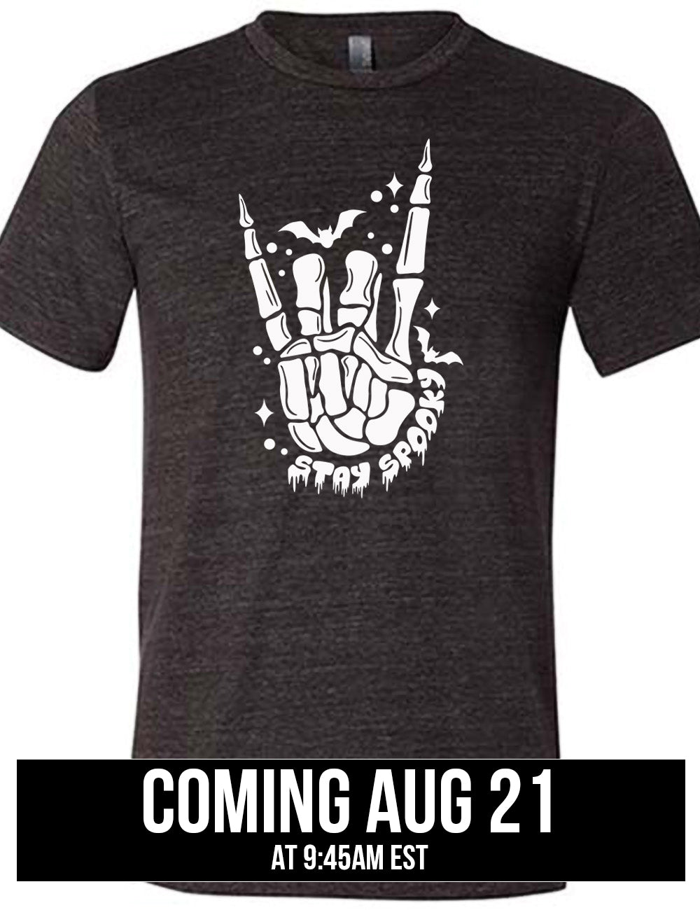 black unisex tee with the large graphic of a rocker skeletal hand, with two little bats, and few stars and dots, with the words underneath saying "stay spooky", coming august 21st