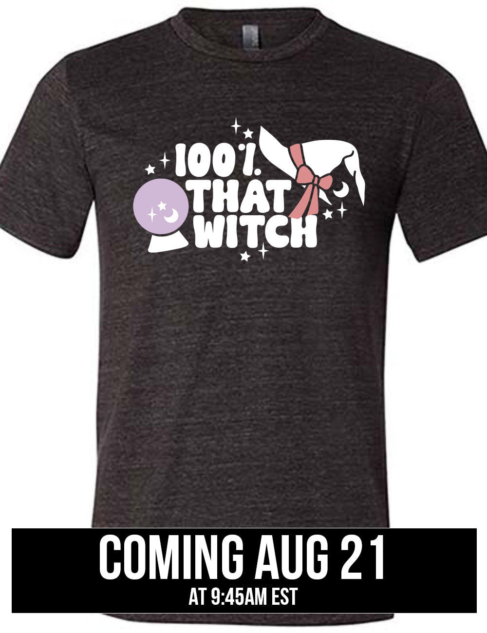 black unisex tee with the words "100% that witch" next to the graphic of a witch hat with a bow, a crystal ball, and some stars, coming august 21st