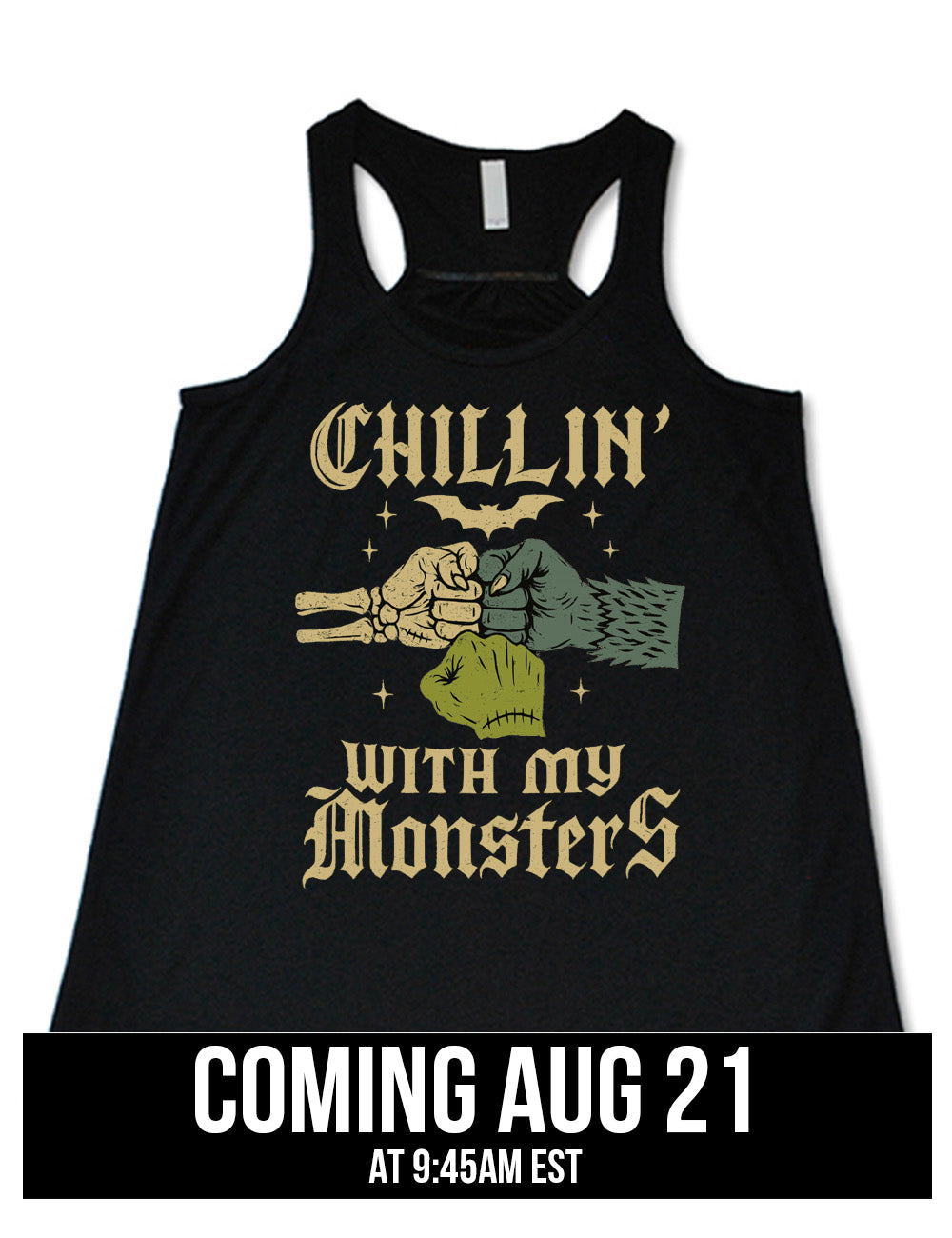 black modern tee with the words "chillin' with my monsters" around the graphic of a skeleton's hand, a werewolf's hand, and a zombie's hand, doing a fist pump, with a bat above, and few stars around, coming august 21st
