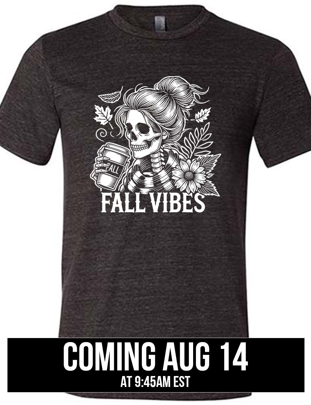 black unisex tee with the graphic of a skeletal woman, with her hair in a bun, holding a takeaway coffee cup labeled "fall", with a flower and leaves next to her, and the words underneath saying "fall vibes", coming august 14th