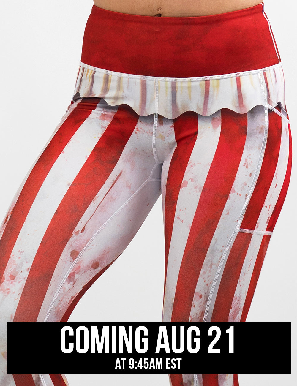 front of the bloody red and white stripes circus leggings against a white background, coming august 21st