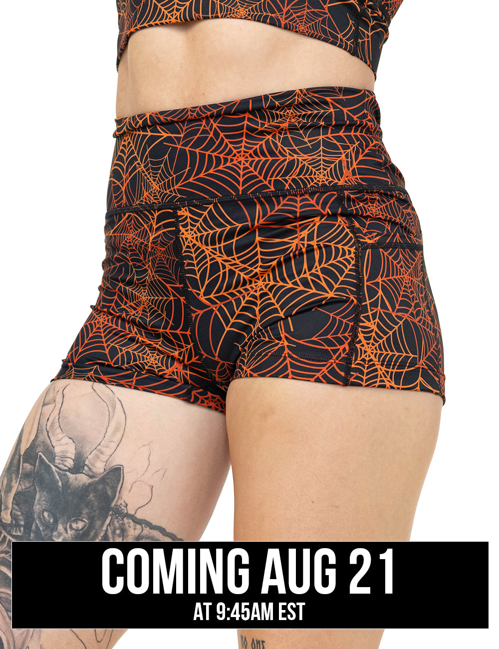 front of the orange spider webs against a black background 2.5 inch shorts coming august 21st