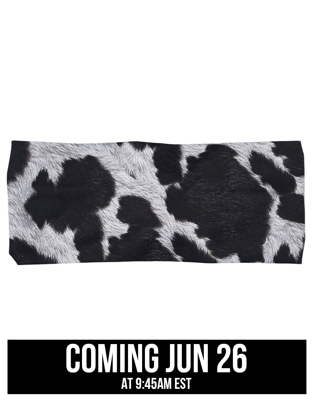 front of the cow print headband against a white background, coming june 26th