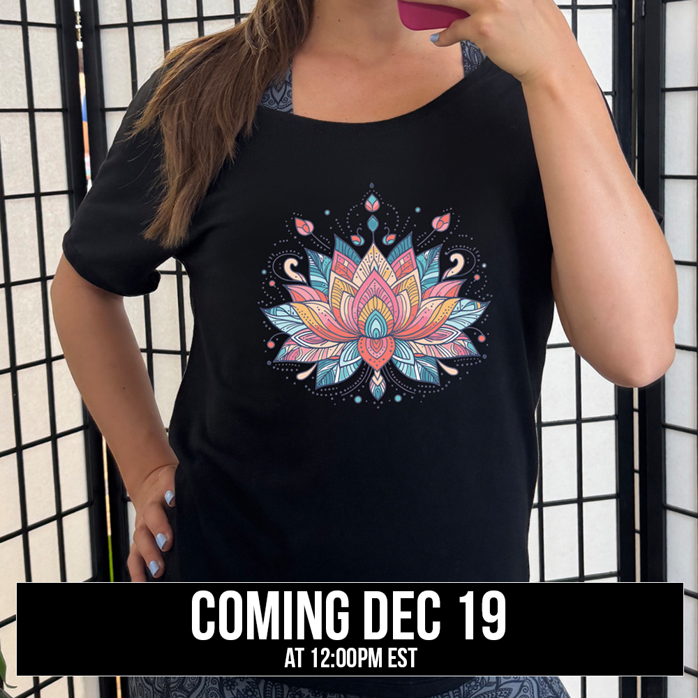 Black slouchy shirt with the graphic of a colorful, stained-glass-look lotus flower