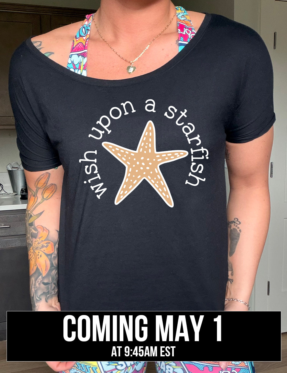 black slouchy tee with the graphic of a starfish, and the words arched around it saying "wish upon a starfish", coming soon