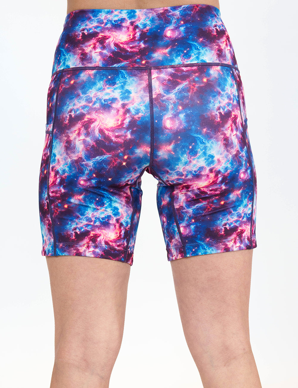 back of the 7 inch galaxy patterned shorts against a white background
